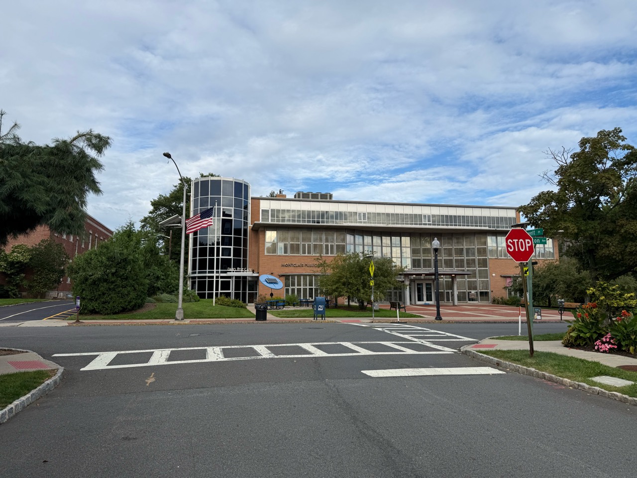 A wider view of Montclair Public Library from across the street.